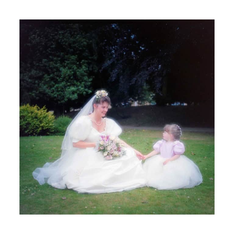 Dorset Wedding Photographer – Image of Bride and young bridesmaid