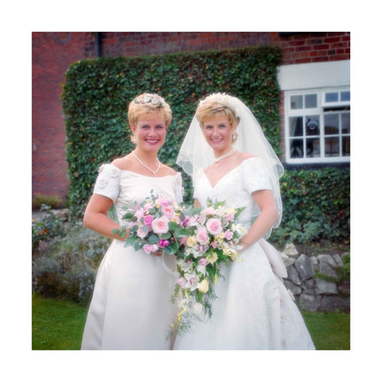 Dorset Wedding Photographer – Image of Bride and Bridesmaid at reception