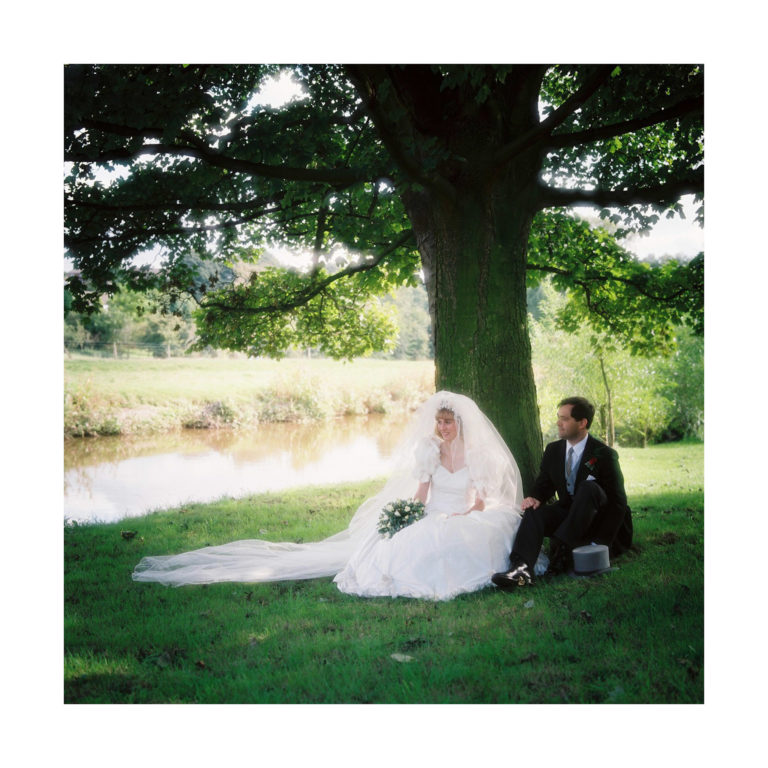 Wedding Photographer in Dorset – Dave Broomfield - Image of Bride and Groom in by river